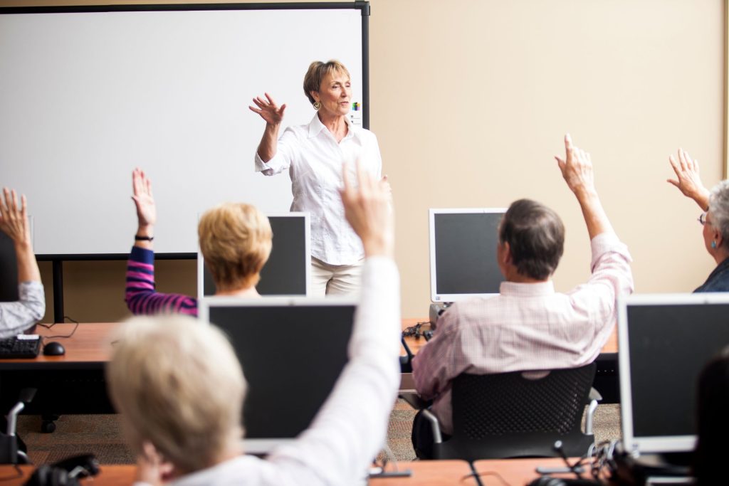 Adults engaged in a Lifelong Learning course at The Center in Duxbury, MA